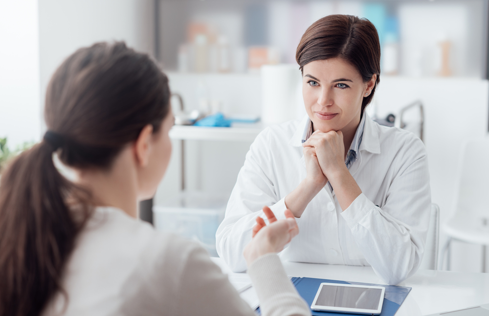 doctor listening to patient intently