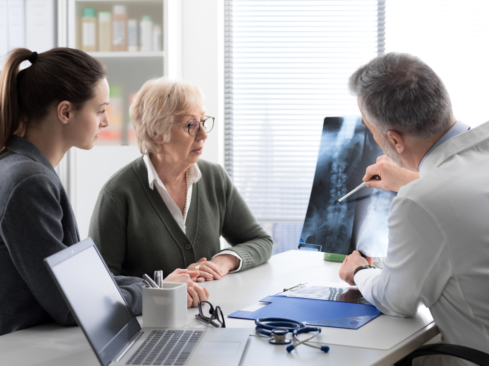 Woman looking at bone density results