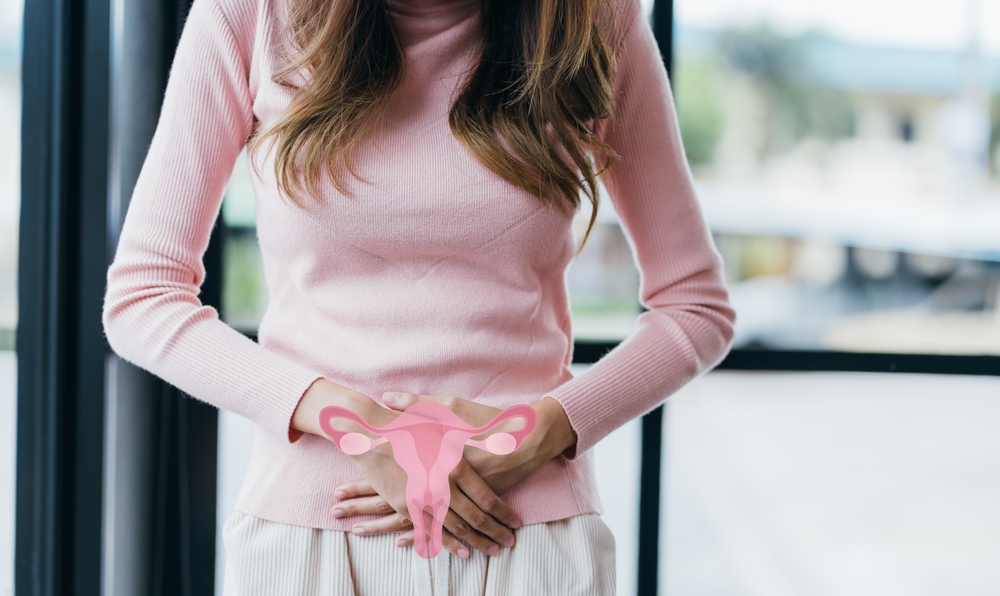 woman holding her stomach